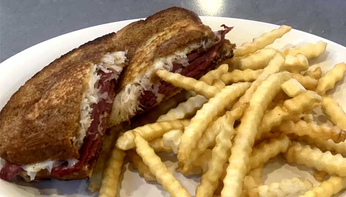 Reuben sandwich served at Wiggly Field & Dome restaurant, sports bar and volleyball courts in Weston, WI